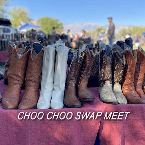 The image shows a row of cowboy boots displayed on a table, labeled "CHOO CHOO SWAP MEET."