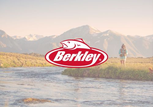 A person fishing by a river with mountains in the background, a Berkley logo centered over the scene, sunny outdoor setting.